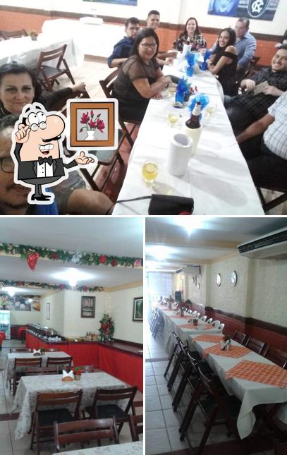 Entre diferentes coisas, interior e mesa de jantar podem ser encontrados no Restaurante Nossa Casa Buffet E Eventos