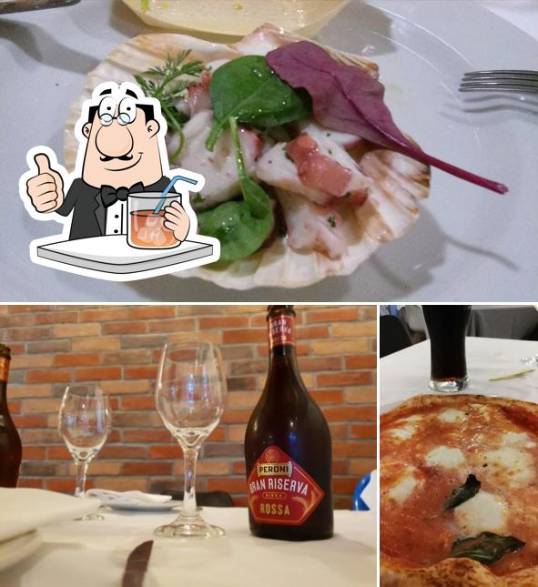 Guarda la foto che raffigura la bevanda e cibo di Il Caminetto