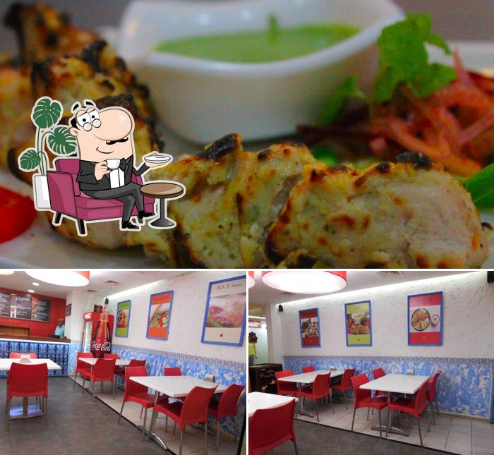 Check out the image displaying interior and food at Mama's Pizzeria & Cafe