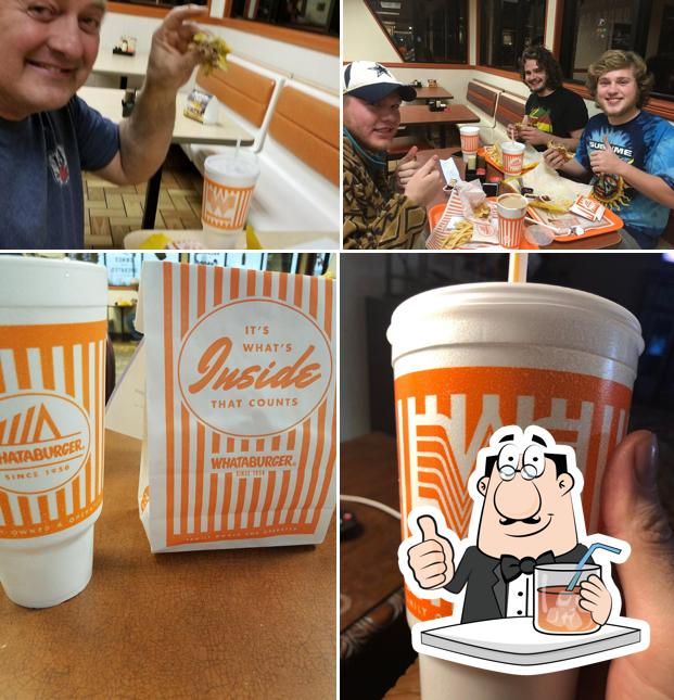 The photo of drink and dining table at Whataburger