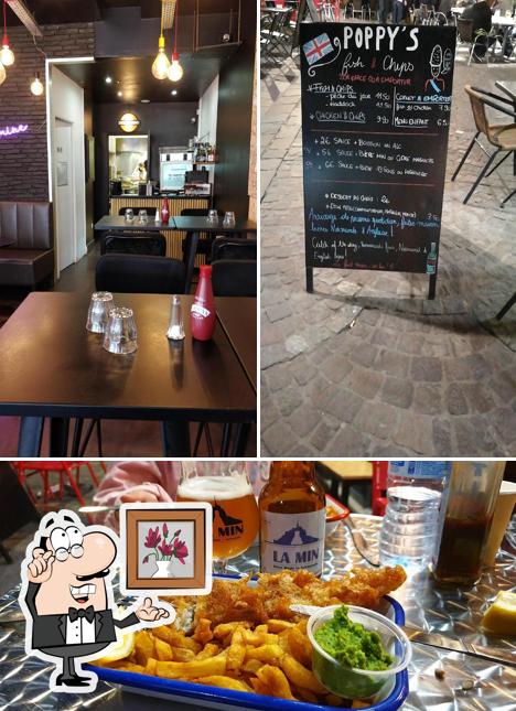 The picture of interior and beer at Poppy's Burgers