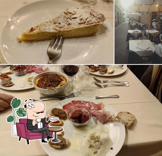 Tra le diverse cose da Trattoria Paccì si possono trovare la interni e cibo