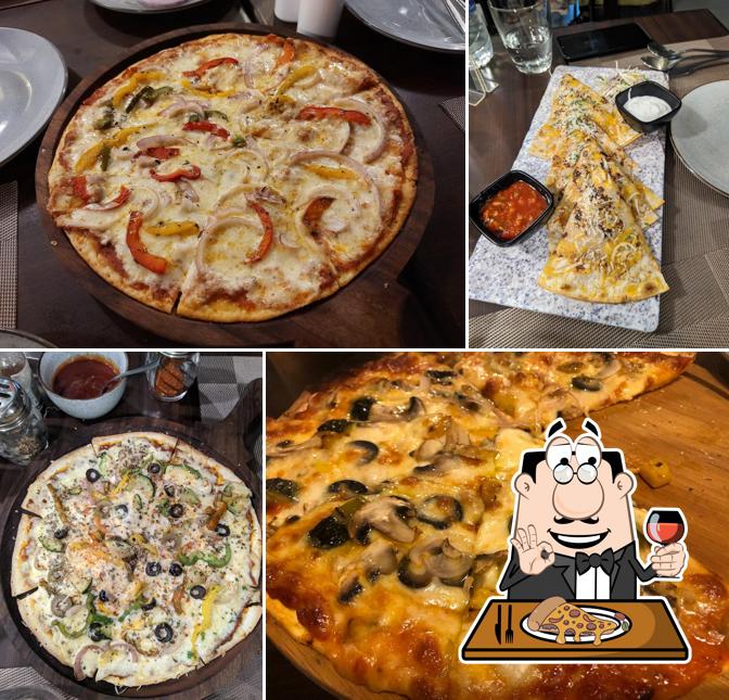 Pick pizza at The Sky Kitchen & Banquets