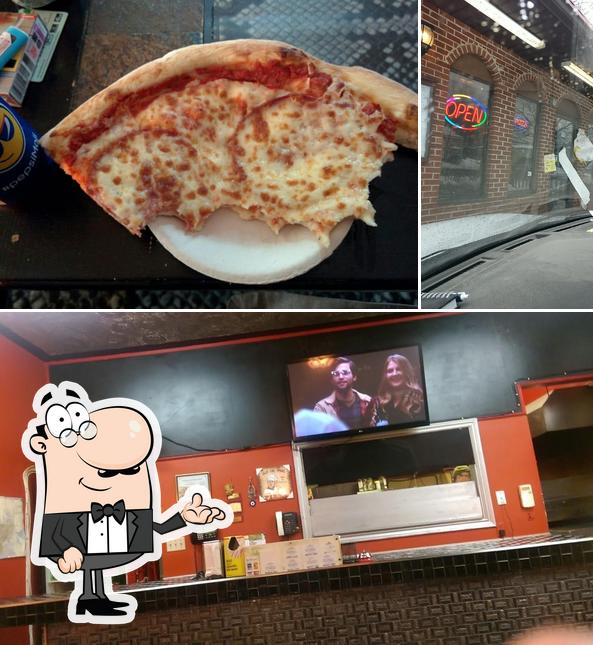This is the photo showing interior and pizza at Pizza Girls Dartmouth