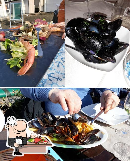 Отведайте блюда с морепродуктами в "Ristorante La Cambusa Presso Stabilimento Molto"