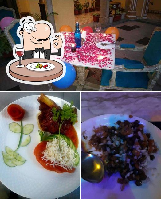 Among different things one can find food and dining table at Chak74