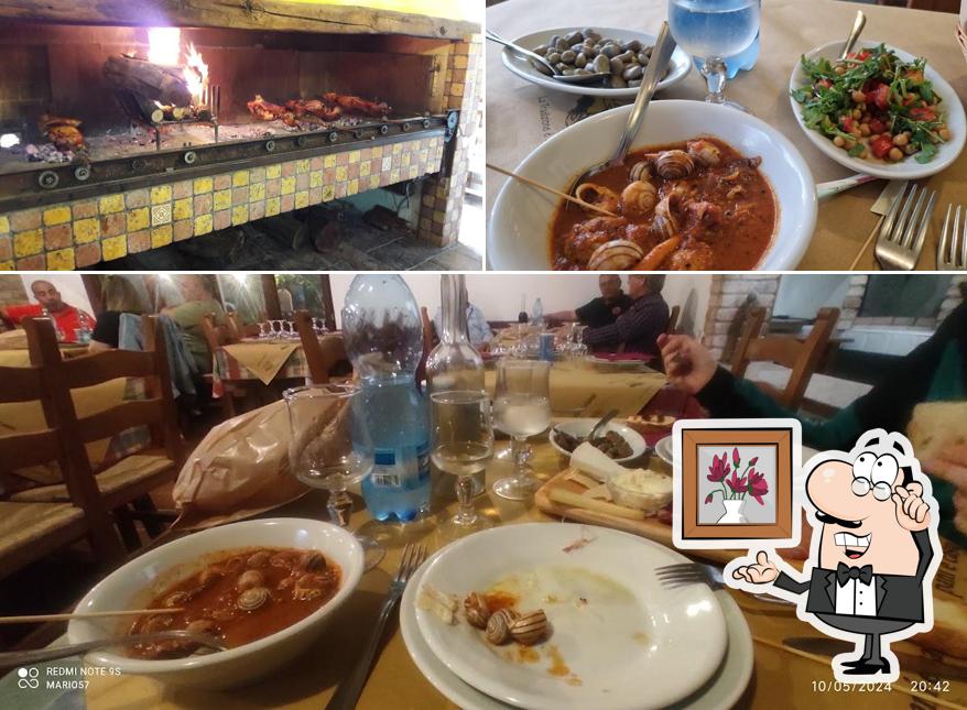 Ristorante Sa Mesa si caratterizza per la interni e cibo