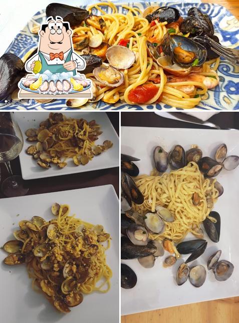 Отведайте блюда с морепродуктами в "Osteria S. Lucia"