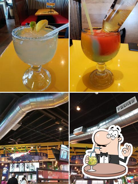 Check out the photo showing drink and exterior at Fuzzy's Taco Shop