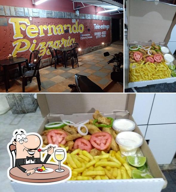 Entre diferentes coisas, comida e interior podem ser encontrados no Pizzaria Fernando