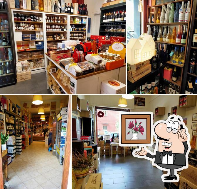 Gli interni di Enoteca Grappolo Blu Vini Salumi & Formaggi