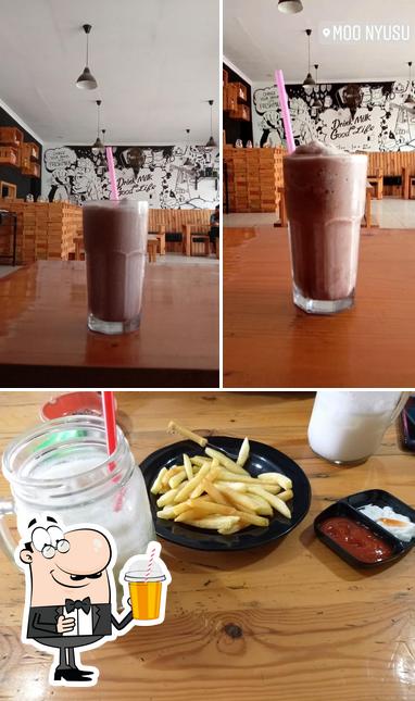 Enjoy a beverage at Moo Nyusu Serang