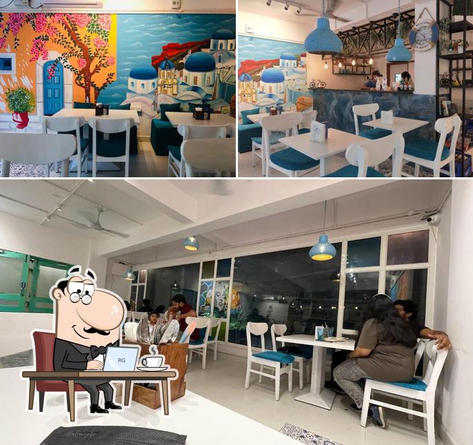 Take a seat at one of the tables at CAFE ROSCA