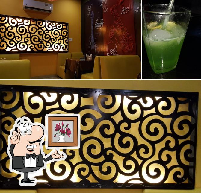The photo of Hutt Cafe and Restaurant’s interior and beverage