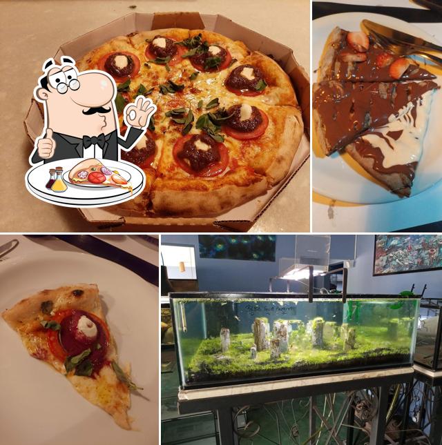 No Pizzaria Família Duarte - Centro, você pode degustar pizza