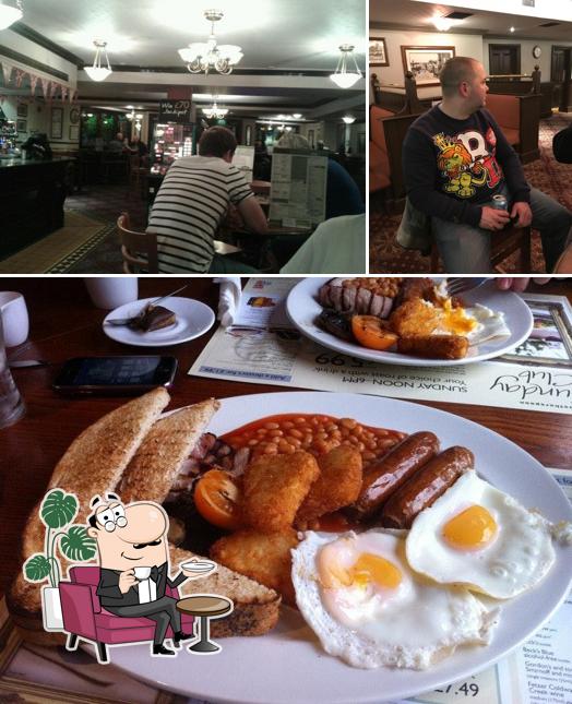 This is the photo displaying interior and food at The Dragon Inn - JD Wetherspoons