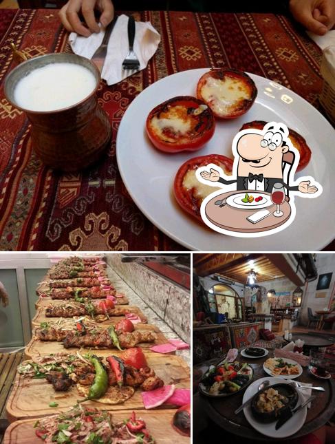 Take a look at the photo displaying dining table and food at Göreme Restaurant