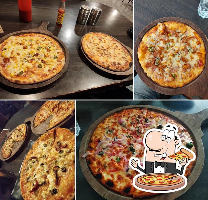 Try out pizza at Hot Stone Kitchen