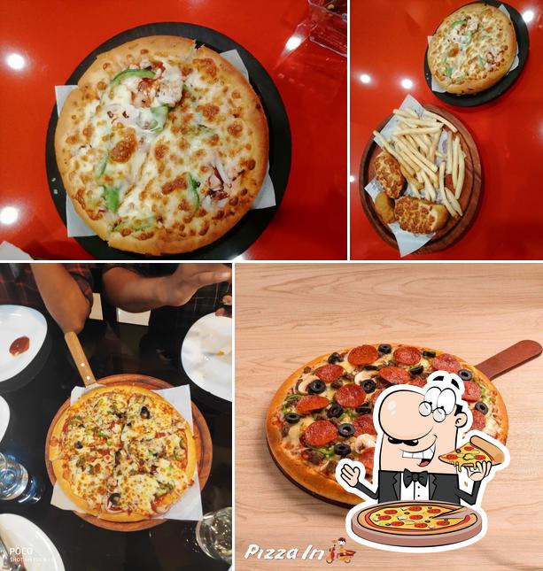 Pick pizza at Pizza inn manjeri