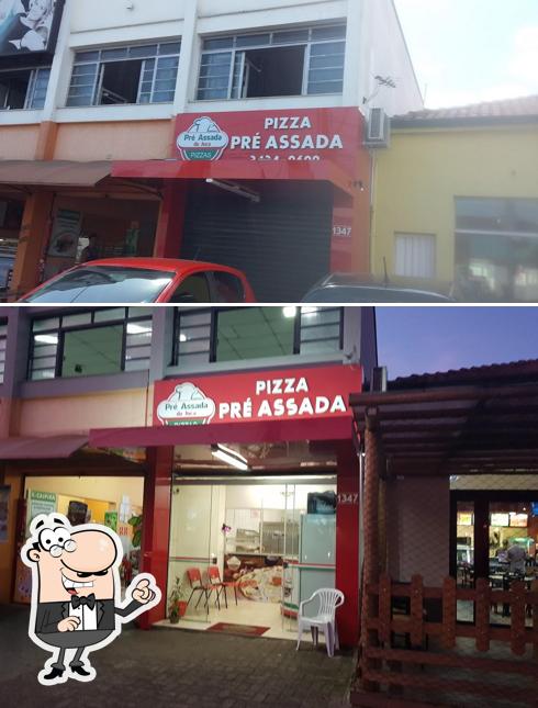 O interior do Pizzaria Pré Assada do Juca