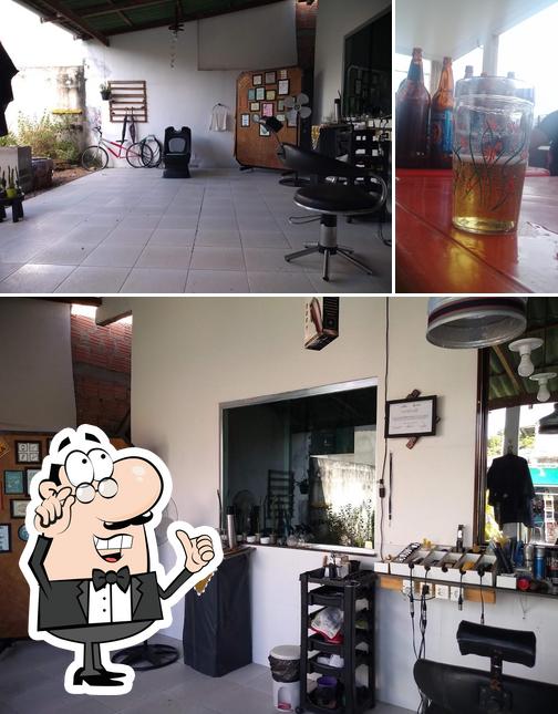 Esta é a foto apresentando interior e cerveja no Bar Do Bigode