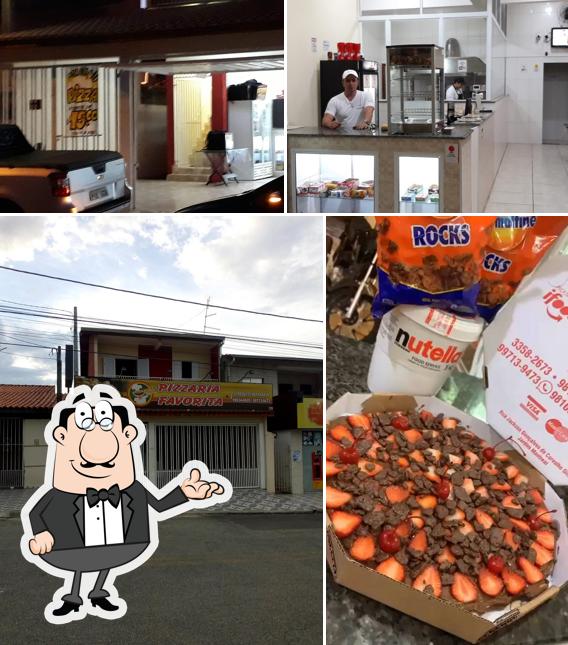 O interior do Pizzaria Favorita