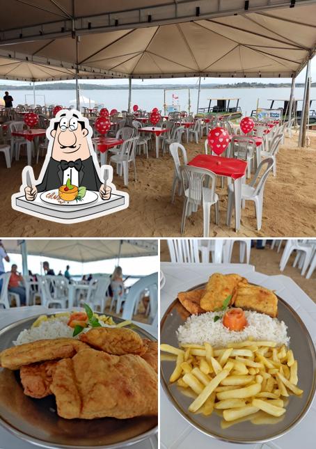 Dê uma olhada a imagem ilustrando comida e interior no Três Ranchos Acqua Park