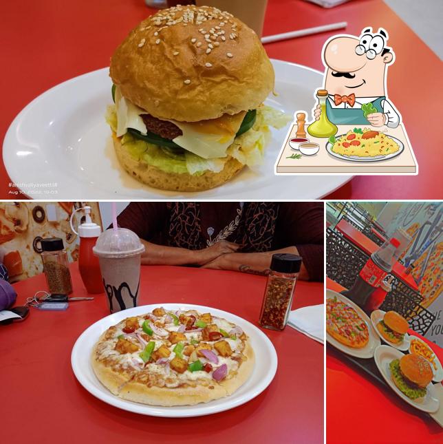 Laziz Pizza Puttur is distinguished by food and dining table