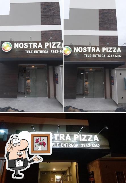 O interior do Nostra Pizza