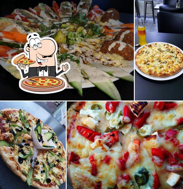 Try out pizza at Happy Falafel