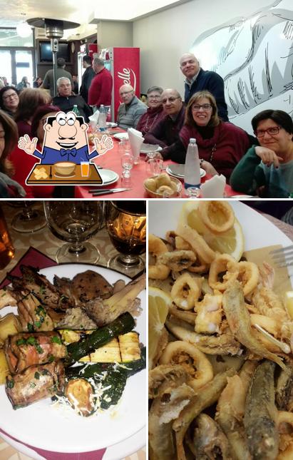 La foto di cibo e tavolo da pranzo da Trattoria-Arricriiti