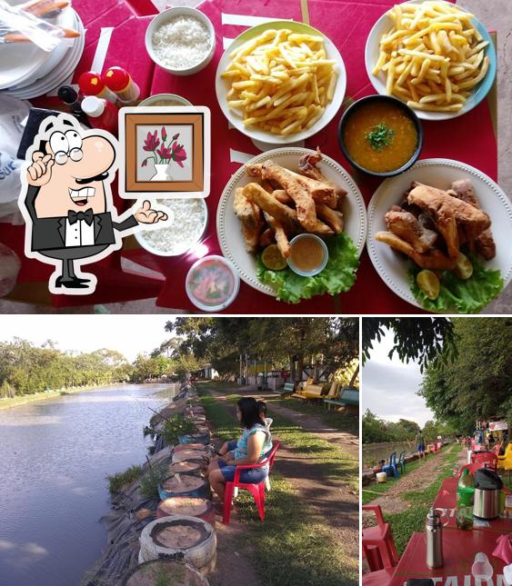 Esta é a foto apresentando interior e comida no Pesqueiro Chácara Divino Pai Eterno