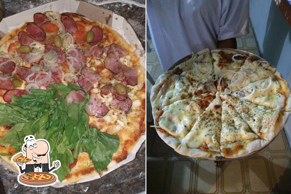 Experimente pizza no Restaurante & Pizzaria Porto Seguro