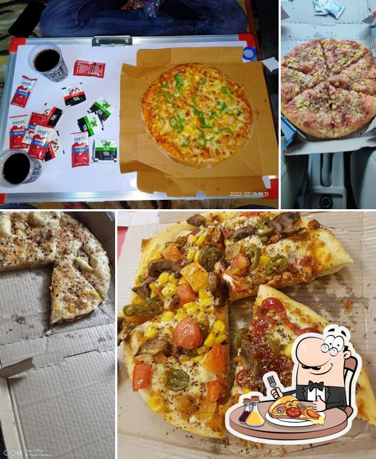 Try out pizza at Domino's pizza