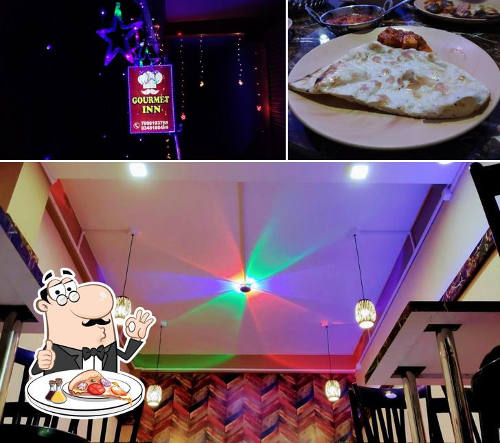 Pick pizza at Gourmet INN