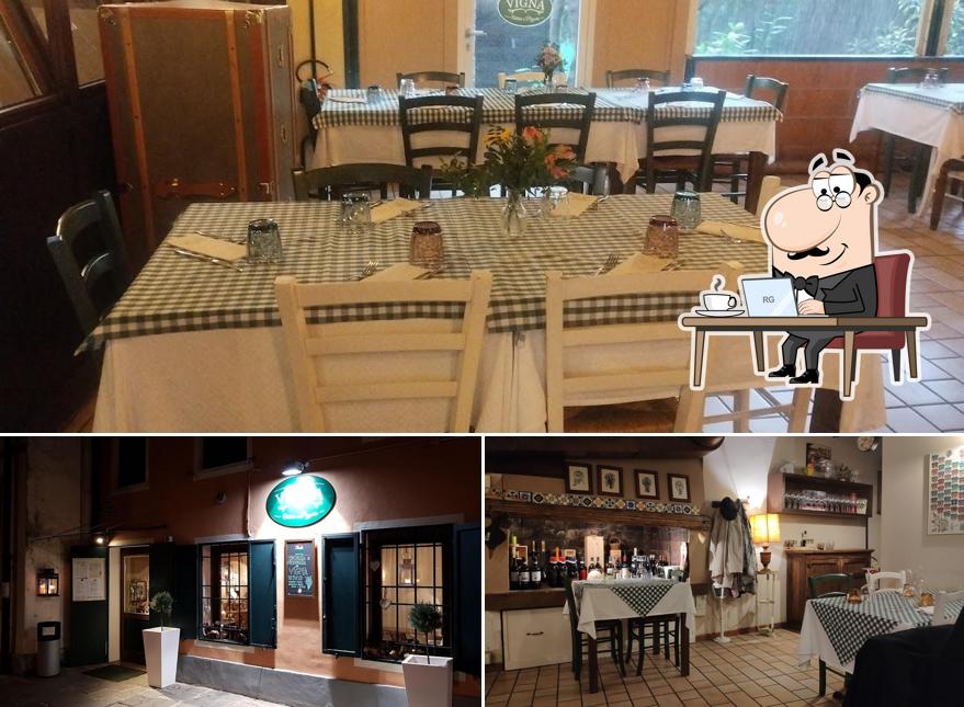 Dai un'occhiata agli interni di Osteria Pizzeria La Vigna