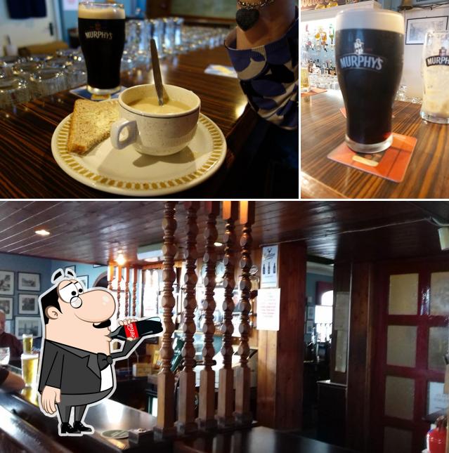 Take a look at the image showing drink and bar counter at Moby Dick's Pub