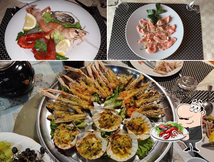 Prenditi la cucina di mare a Ristorante di pesce Bar Il Carpine di Tang pizzeriaia