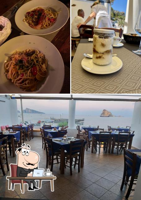 Questa è la immagine che presenta la interni e cibo di Il geco