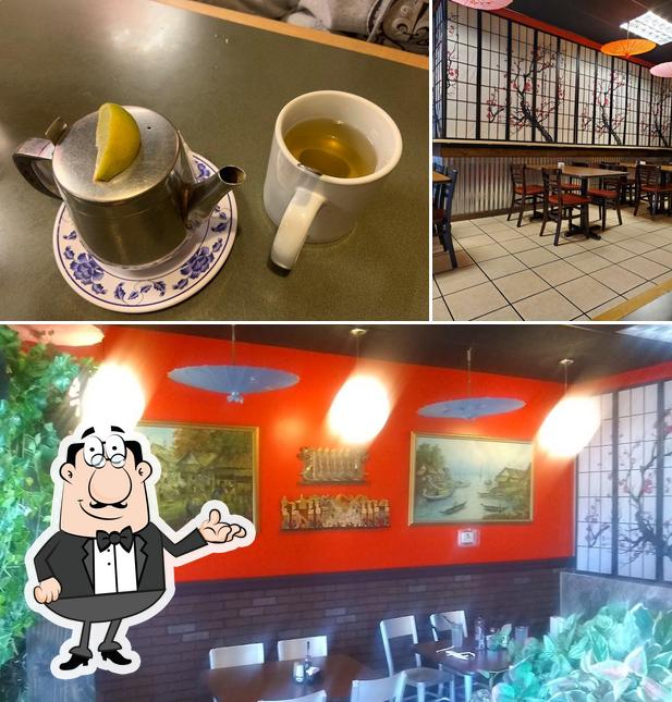 This is the image depicting interior and beverage at Singapore Cafe