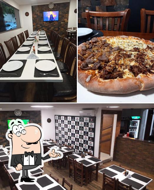 O interior do Tito Pizzaria e Delivery