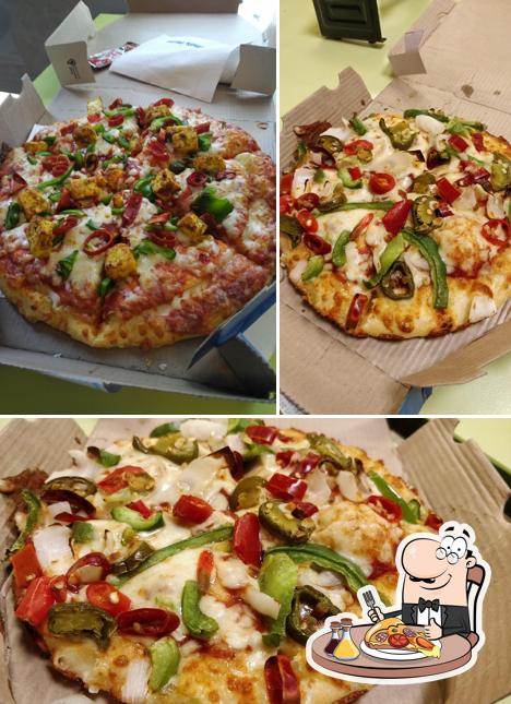 At Domino's Pizza SMS Complex, Mandi, you can try pizza