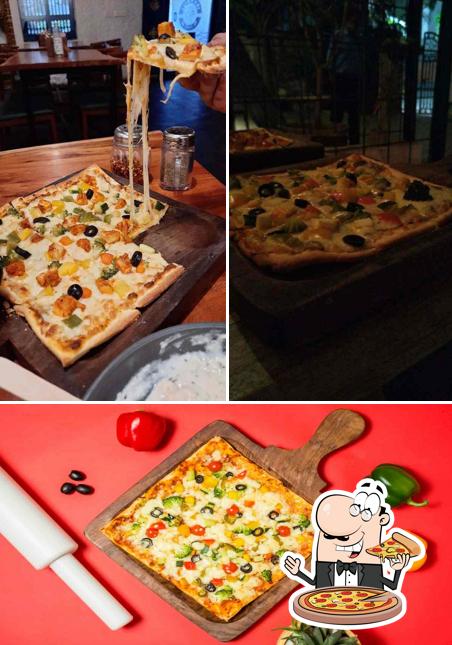 Pick pizza at Ironhill Cafe Film Nagar
