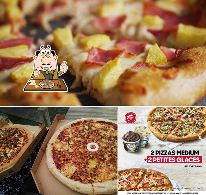 A Pizza Hut, vous pouvez prendre des pizzas