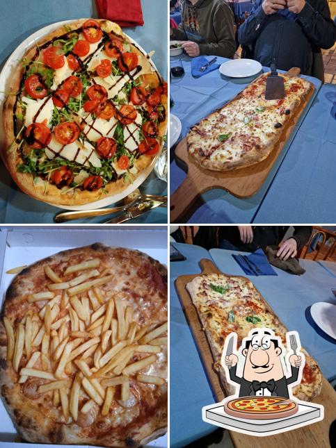 Prenditi una pizza a Pizzeria Ristorante Grotta Azzurra 1 e 2