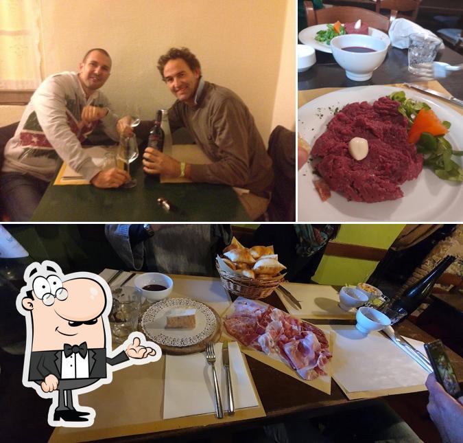 Dai un'occhiata agli interni di Osteria Vecchia Pergola