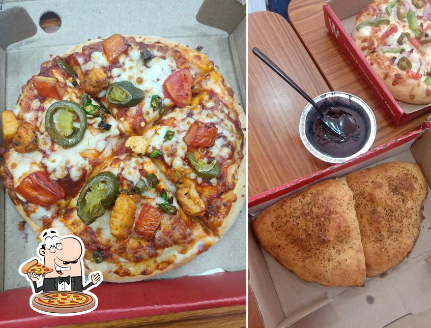 At Pizza Wings Goa, you can enjoy pizza