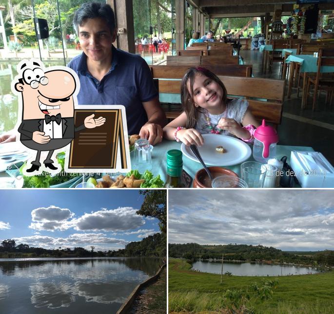 A foto da exterior e mesa de jantar a Charneca