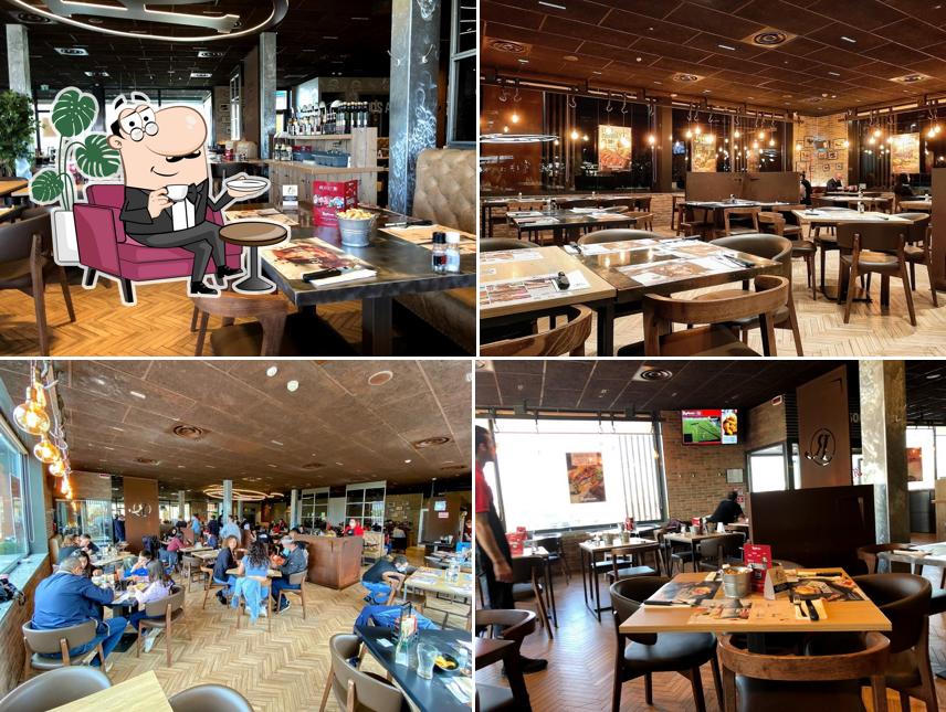 Siediti a un tavolo di Roadhouse Restaurant Fidenza
