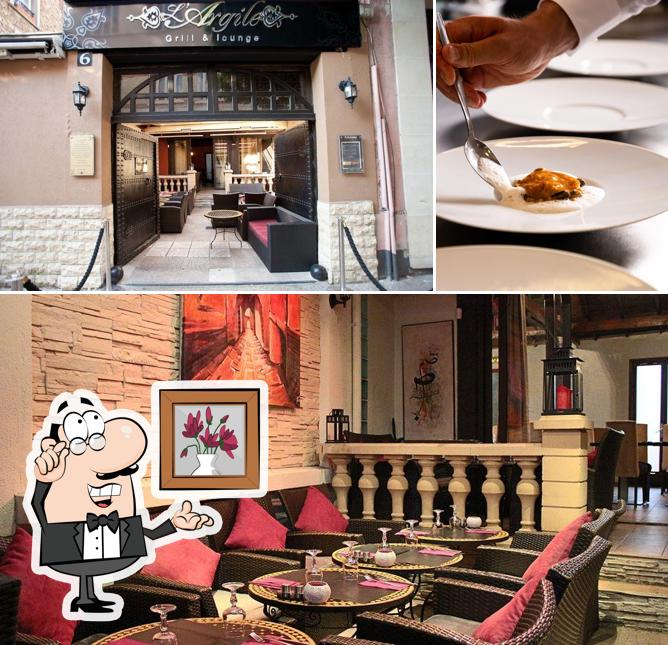 The image of interior and food at L'Argile Restaurant Français
